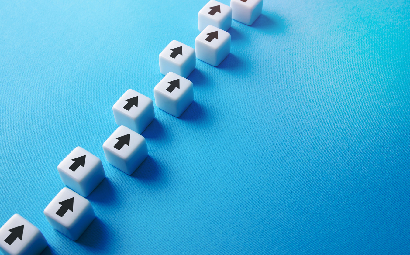 Chain of arrows blocks. Consistency and focus. Concept of conformism, vertical of power. Unchanging course of development. Moving forward. Education and skill growth. Building a solid strategy.
